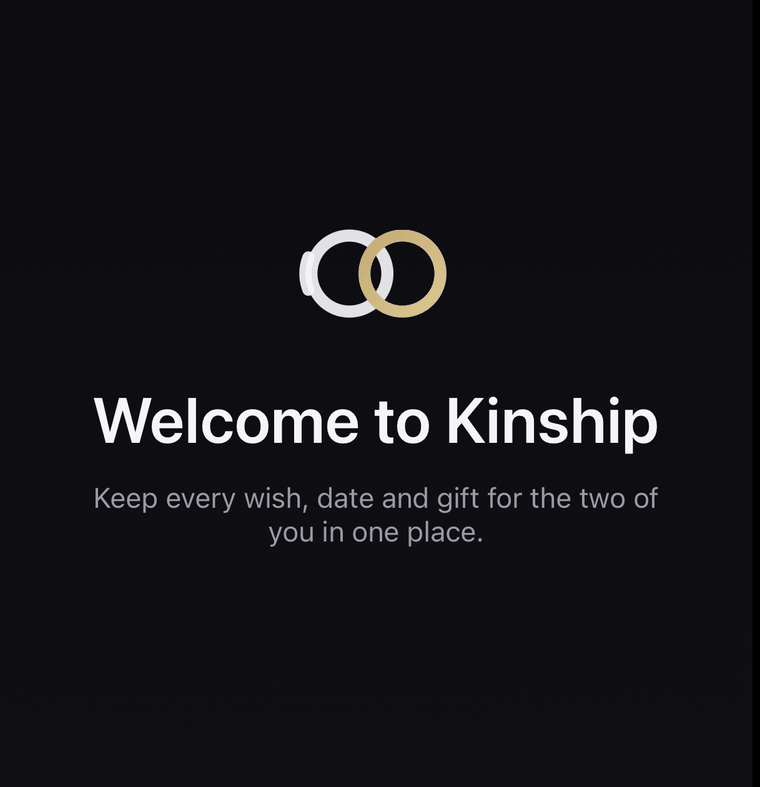 The Kinship welcome screen, showing two interlocking rings on a dark background.